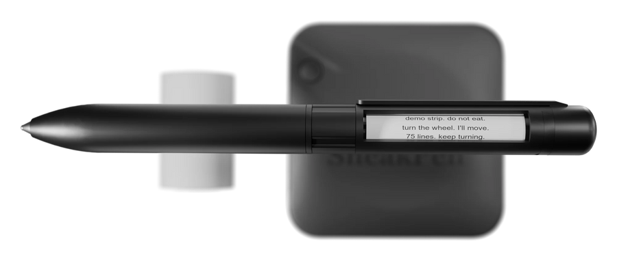 The SneakPen, its pocket printer and a paper roll.